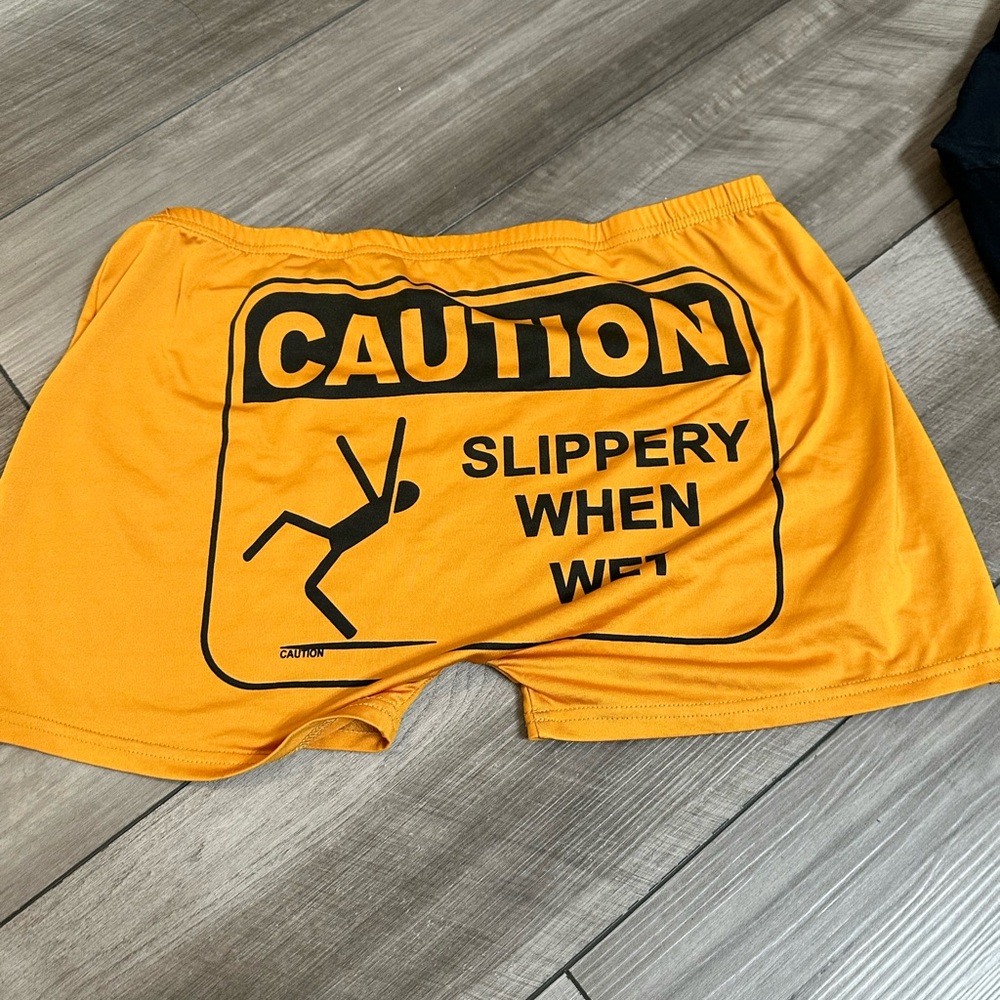 Caution Slippery When Wet Men's Shorts - Yellow